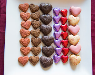 valentines dessert with macarons, candies and chocolate 