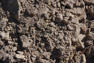 Close-up full frame view of a pile of broken earth at a street repair site
