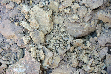 Close-up full frame view of a pile of broken earth at a street repair site