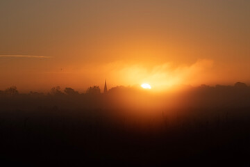 Lever de soleil dans la brume, Marais d'Ares (Gironde)