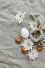 Fototapeta na wymiar Easter eggs on a linen background. Easter background. Copy space. Easter eggs flat lay on rustic table. Easter concepts