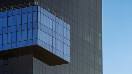 Part of a modern dark glass building. Space for text. Business concept of future architecture.