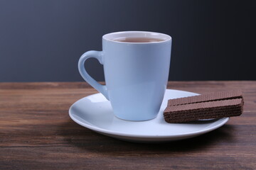 Chocolate Wafer on Wooden Plate, Served with Tea, Copy Space