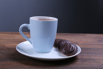 Image of ivory tea cup with sweet heart shaped cookie
