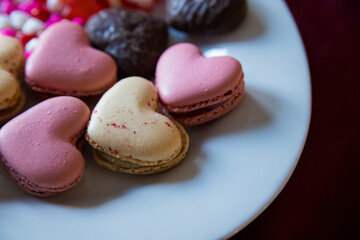 valentines dessert with macarons, candies and chocolate 