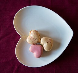 valentines dessert with macarons, candies and chocolate 