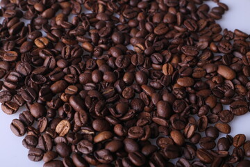 Coffee beans isolated on white background with copyspace for text. Coffee background or texture concept.