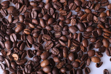 Coffee beans isolated on white background with copyspace for text. Coffee background or texture concept.