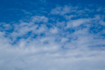 Blue sky and white cloud formations image for background use