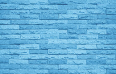 Brick wall painted with pale blue paint pastel calm tone texture background. 