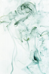 Real colorful smoke on white background. Graphic resource for use with blend modes. Fusion layers.