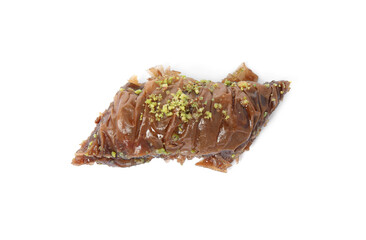 Piece of delicious baklava with pistachios isolated on white, top view