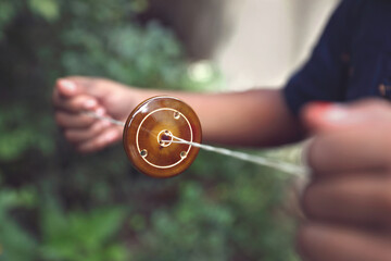 DIY wooden Spinner for Endless Fun - Indian traditional kid's game