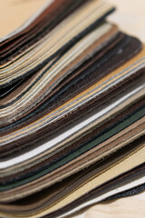Luxury multicolored leather samples close-up. Can be used as background. Industry background. Multicolored palette leather