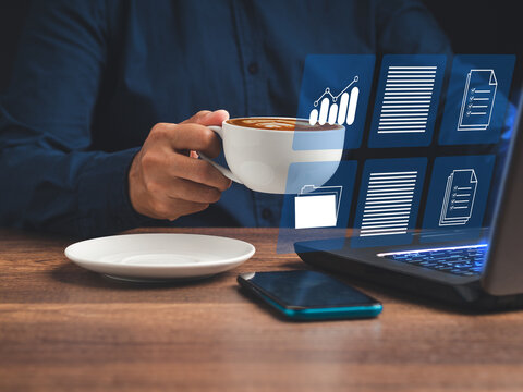 Businessman reading digital documents on a virtual screen - Powered by Adobe