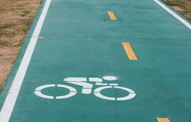 Bike lane sign in park,soft focus.