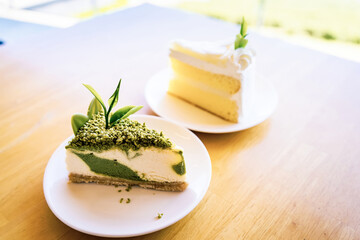 Coconut cake on white plate.