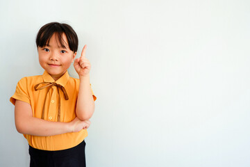 Image/idea/of a thumbs-up woman in a yellow shirt.