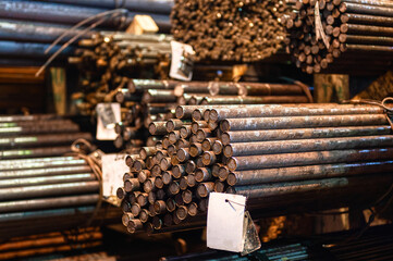 A bundle of round metal bars, steel mill products