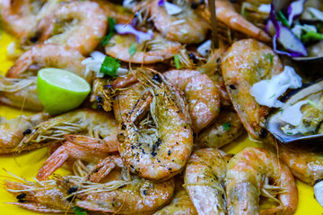 Prepared shrimps and oysters on the plate