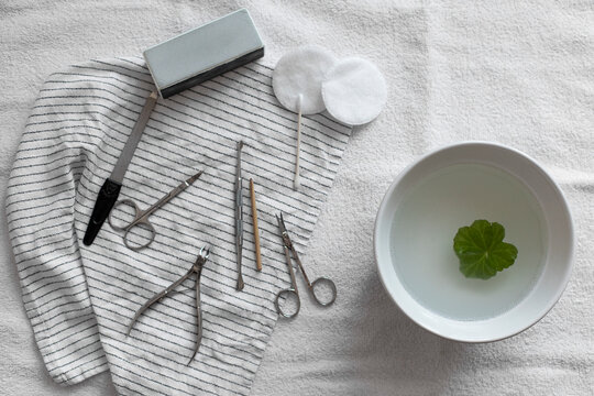 Woman prepared manicure tools at home. Manicure at home.