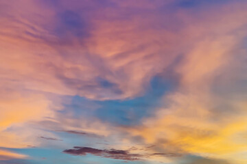Naklejka na ściany i meble Dramatic and colorful sunset in the sky.