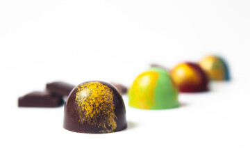 mexican Colorful chocolate candy bonbons and ingredients on white background