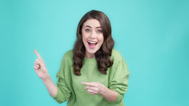 Surprised lady point empty space repost promo isolated cyan color background