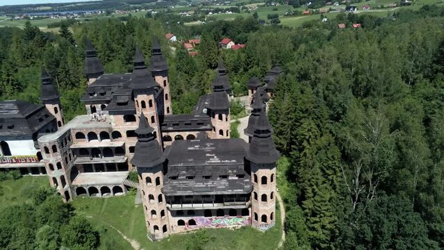 Massive building of Lapalice castle in Poland, aerial drone shot
