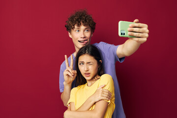 nice guy and girl take a selfie posing hug Youth style