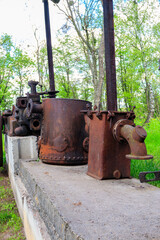 Old steaming threshing machine in Open air Museum of Folk Architecture and Folkways of Middle...
