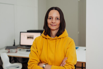 Portrait of a serene and determined 40s woman looking at camera