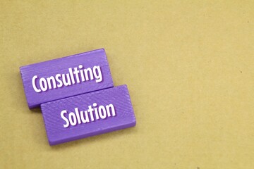 colored board with the words consulting solution