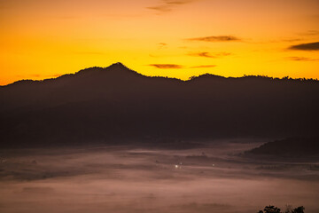 Fototapeta na wymiar Golden light at Sunrise time from Phu Lang Ka.This is one of famous place of North Thailand.