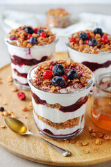 Healthy parfait with muesli berry sauce