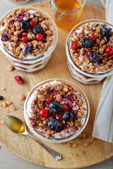 Healthy parfait with muesli berry sauce