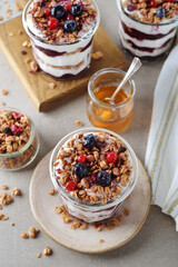 Healthy parfait with muesli berry sauce