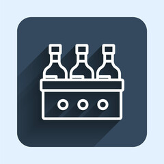 White line Bottles of wine in a wooden box icon isolated with long shadow background. Wine bottles in a wooden crate icon. Blue square button. Vector