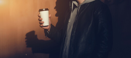  man with coffee cup