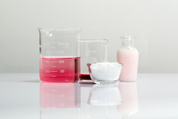 Beauty care cream, Potassium Permanganate Liquid and Cetyl esters wax on white laboratory table.