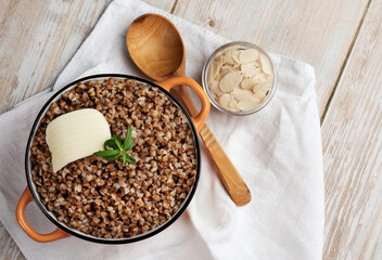 Boiled buckwheat porridge in a pot.Natural organic buckwheat cereal.Buckwheat contains a large amount of vitamins and minerals.