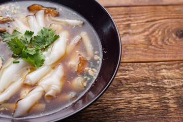 boiled Chinese pasta square, Rolled Rice Noodles or Noodle and Kuayjub Shop. what we call in thai  