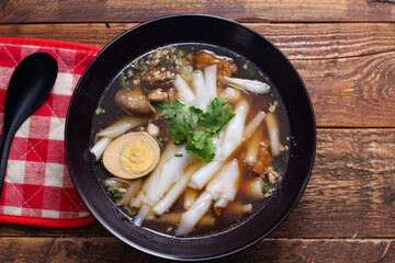 boiled Chinese pasta square, Rolled Rice Noodles or Noodle and Kuayjub Shop. what we call in thai  