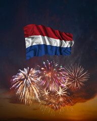 Holiday fireworks and flag of Netherlands