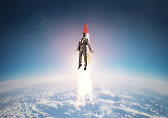 Business person in aviator hat flying on rocket