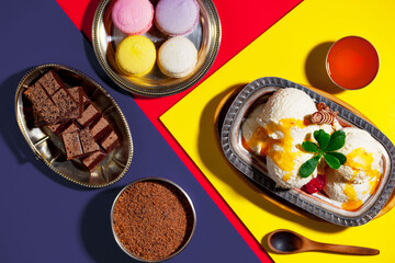 Ice cream on the table on a bright, colored background