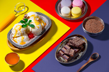 Ice cream on the table on a bright, colored background