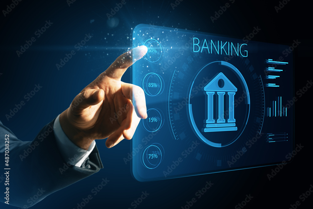 Poster man hand pointing at creative online banking hologram on blue blurry background. ai and automation c
