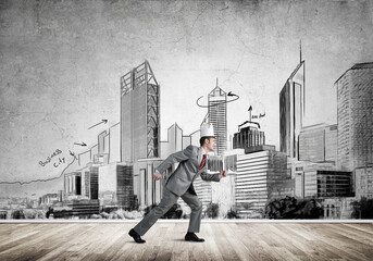 King businessman in elegant suit running and drawn cityscape silhouette at background