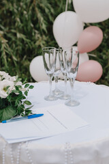wedding glasses and wedding decor with flowerds